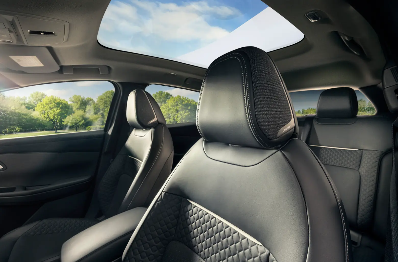 Interior image of the driver's headrest in the 2027 Eclipse Sportback EV showing the built in Bose speakers