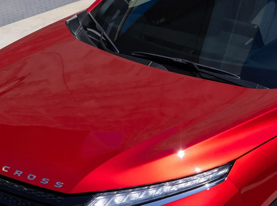 a red eclipse cross showcasing the hood of the car