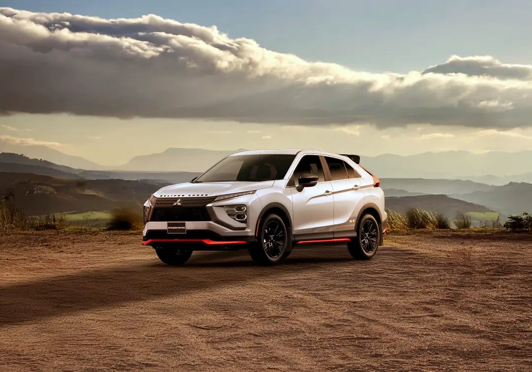 A white Eclipse Cross parked in the desert. 