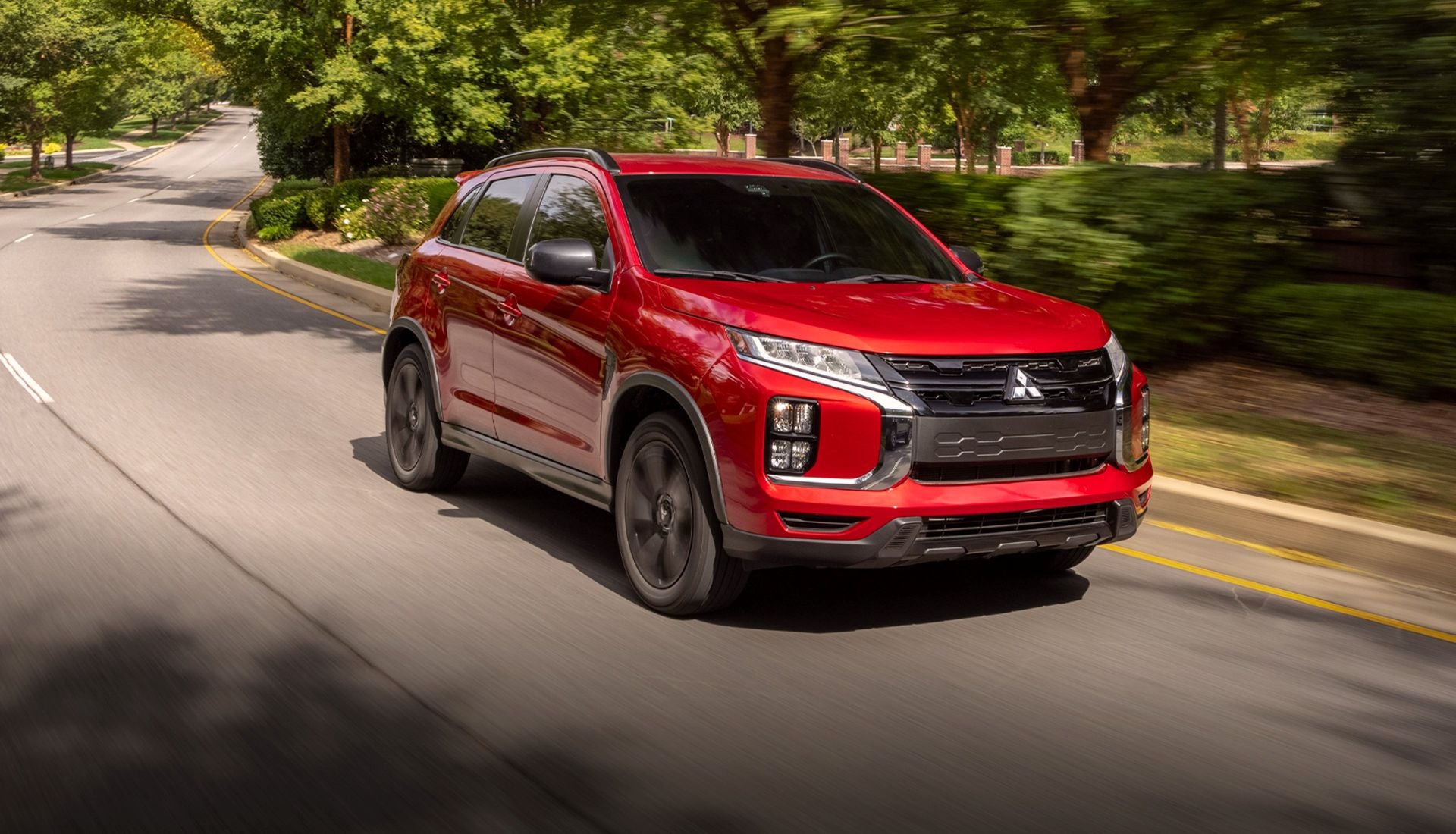 2026 Mitsubishi Outlander Sport driving on a road