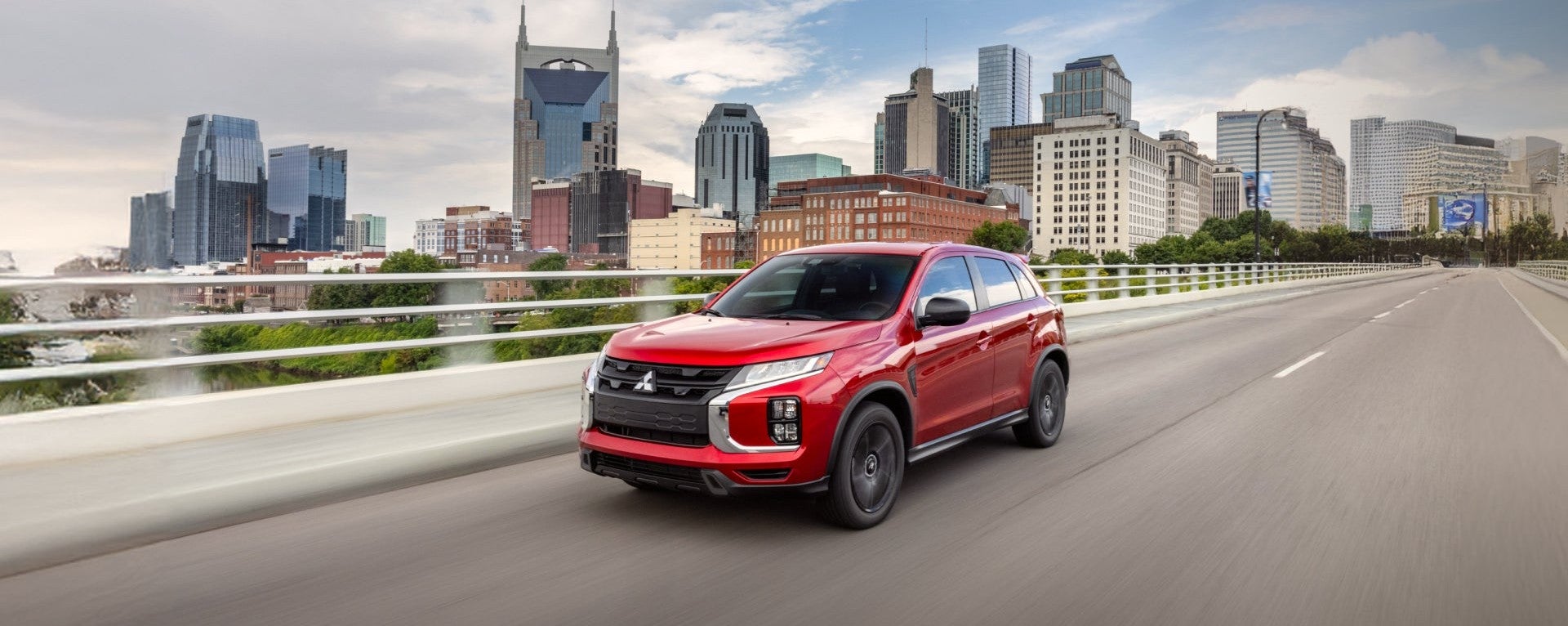 2026 Mitsubishi Outlander Sport driving on a road